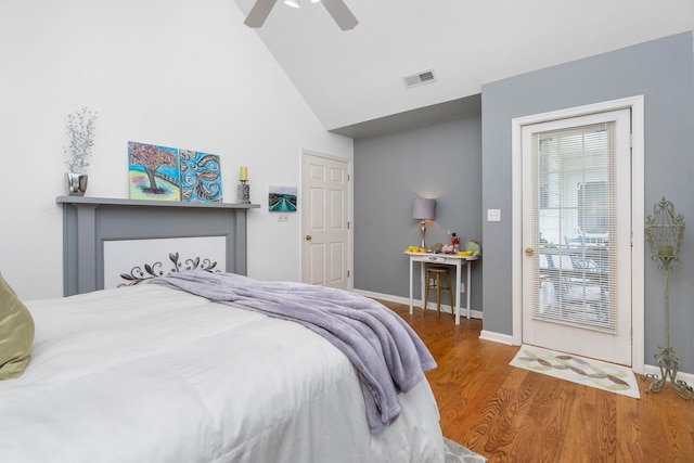 bedroom featuring hardwood / wood-style flooring, high vaulted ceiling, and ceiling fan