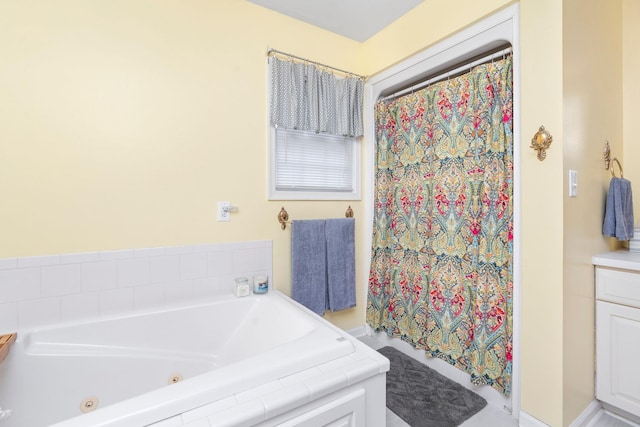 bathroom featuring tiled tub