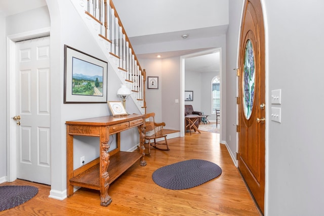 entrance foyer with light hardwood / wood-style flooring