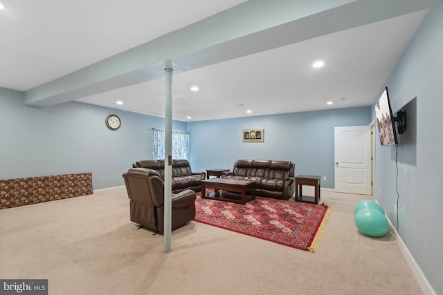 living room featuring recessed lighting, baseboards, and light colored carpet