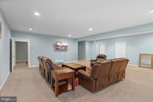 home theater featuring light carpet, baseboards, and recessed lighting