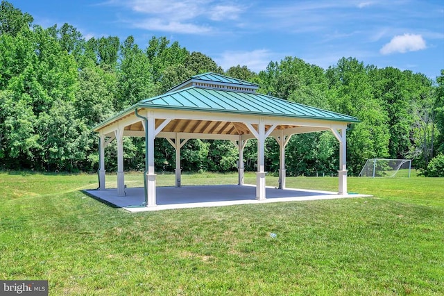 view of community with a gazebo and a lawn