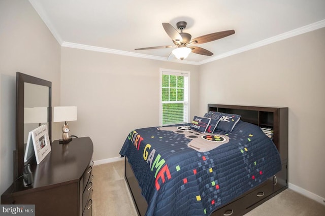 bedroom featuring crown molding, light carpet, and ceiling fan