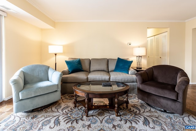 living room with baseboards and ornamental molding