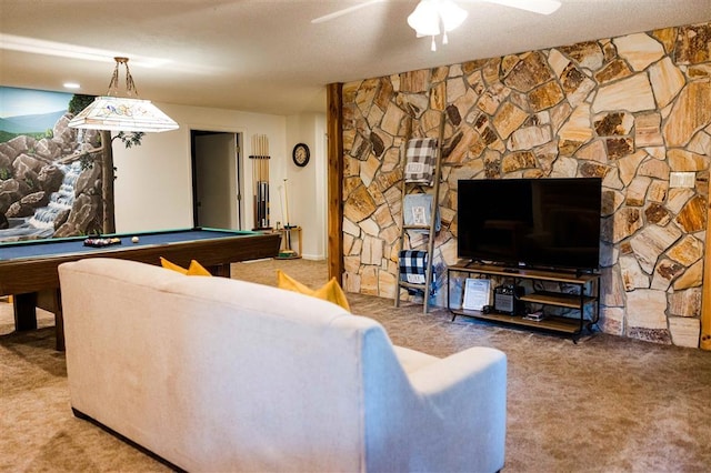 carpeted living room with a ceiling fan, billiards, and a textured ceiling