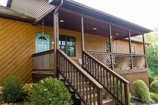 doorway to property with a porch