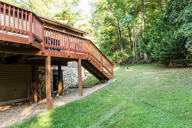 view of yard with a deck and stairway