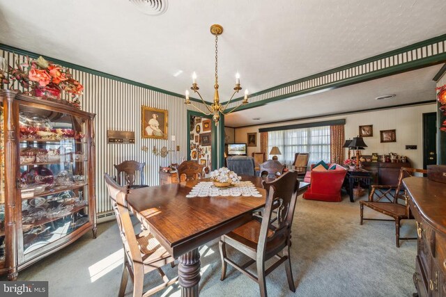 carpeted dining space featuring a notable chandelier