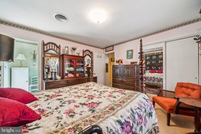 bedroom featuring carpet flooring