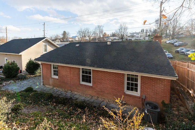 view of home's exterior featuring cooling unit