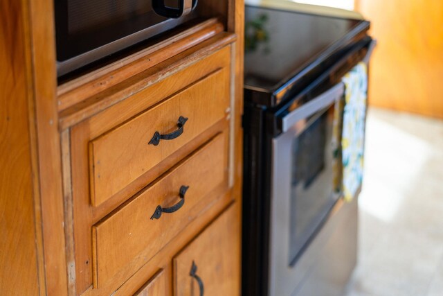 interior details featuring appliances with stainless steel finishes