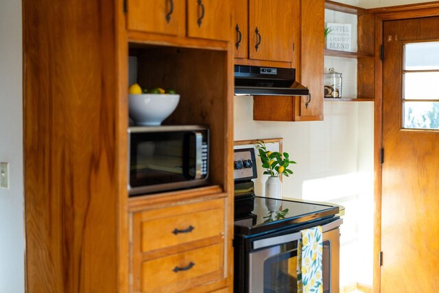 kitchen featuring stainless steel range with electric stovetop