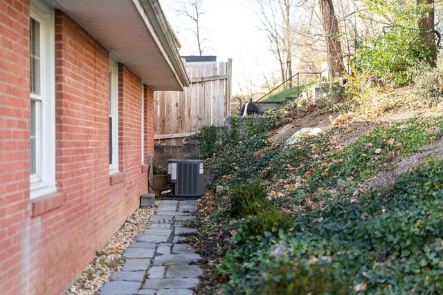 view of property exterior featuring central AC