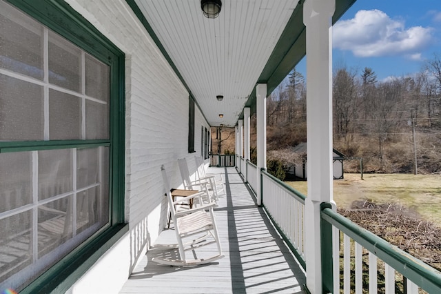 balcony featuring covered porch