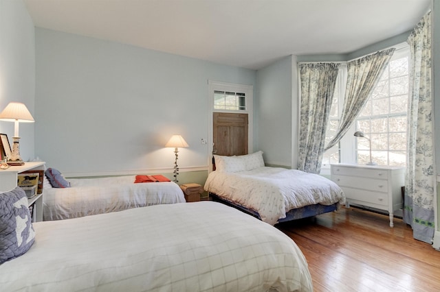 bedroom featuring hardwood / wood-style flooring