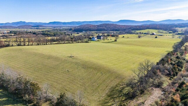 bird's eye view with a mountain view and a rural view