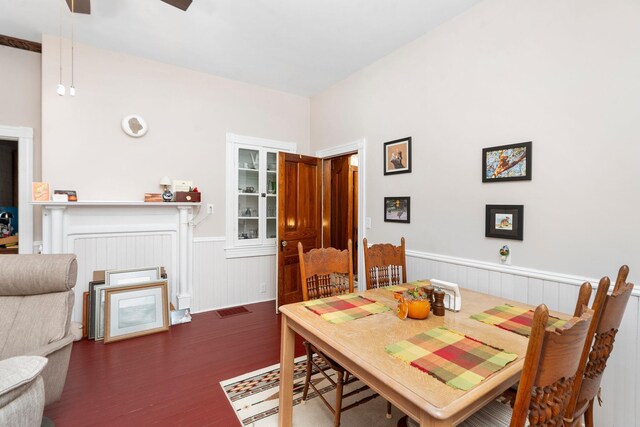 dining space with dark hardwood / wood-style floors