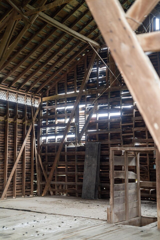 miscellaneous room with lofted ceiling