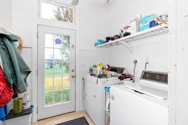 laundry room with a wealth of natural light and independent washer and dryer