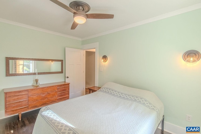 bedroom with a ceiling fan, baseboards, dark wood-style floors, and ornamental molding