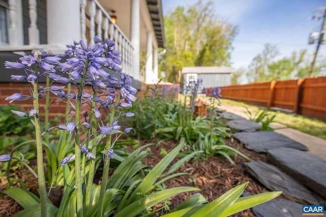exterior details featuring fence