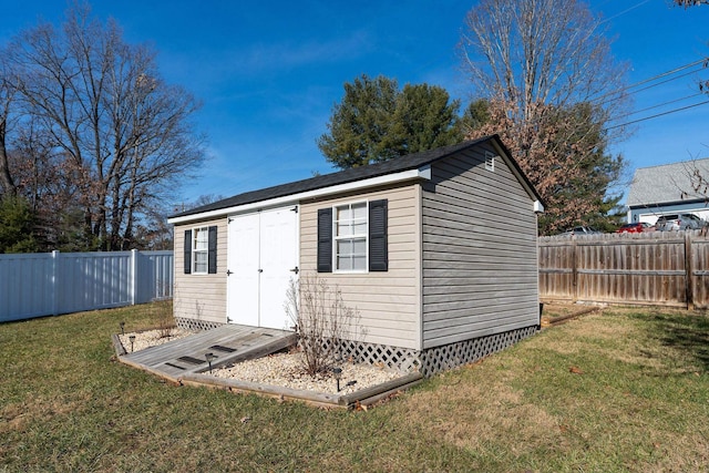 view of outdoor structure featuring a yard