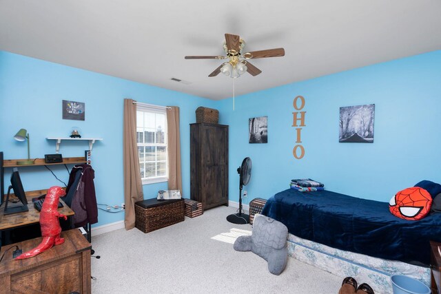 carpeted bedroom with ceiling fan