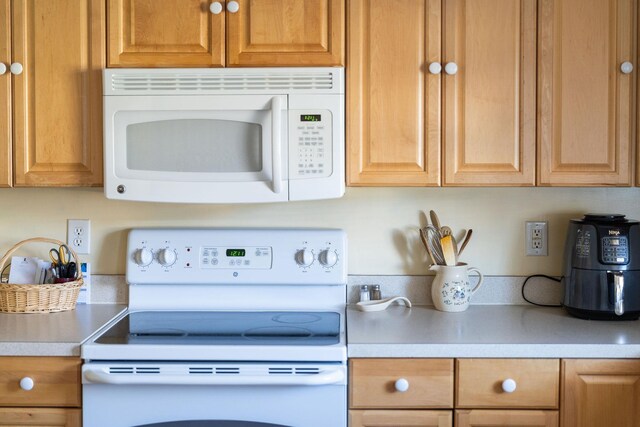 kitchen with white appliances