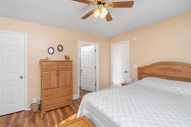 bedroom featuring ceiling fan and hardwood / wood-style floors