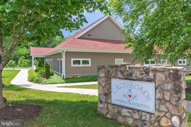 view of home's exterior featuring a yard