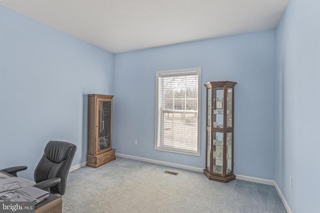 view of carpeted home office