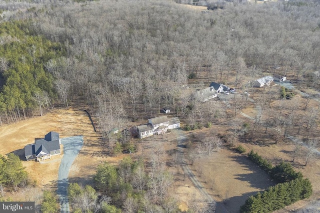 birds eye view of property with a rural view