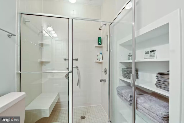 bathroom with a stall shower