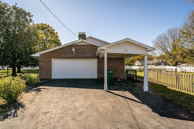 view of front of home with a garage