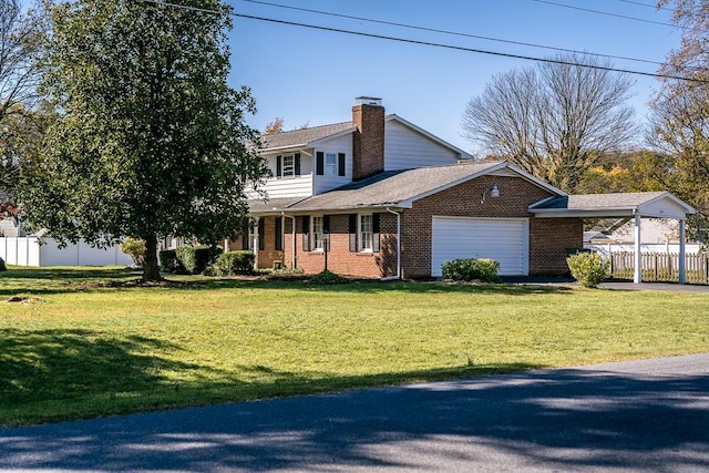 front facade with a garage, a front yard, and a carport