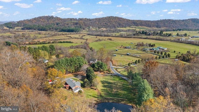 birds eye view of property featuring a rural view and a mountain view