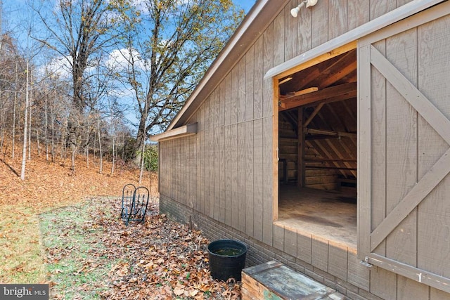 view of property exterior featuring an outdoor structure