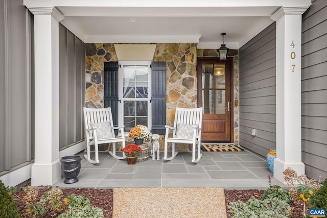 view of exterior entry with stone siding