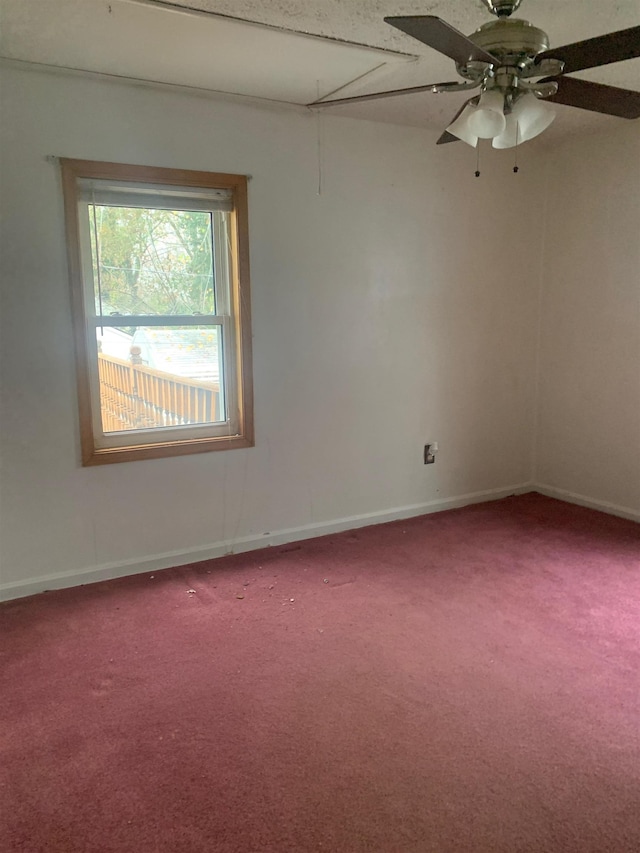 carpeted empty room with ceiling fan