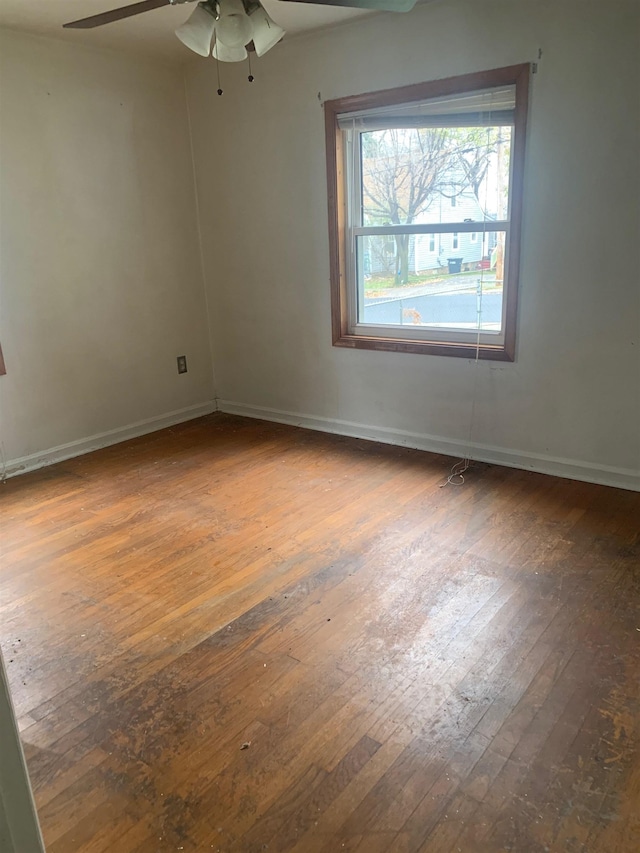 unfurnished room featuring wood-type flooring and ceiling fan