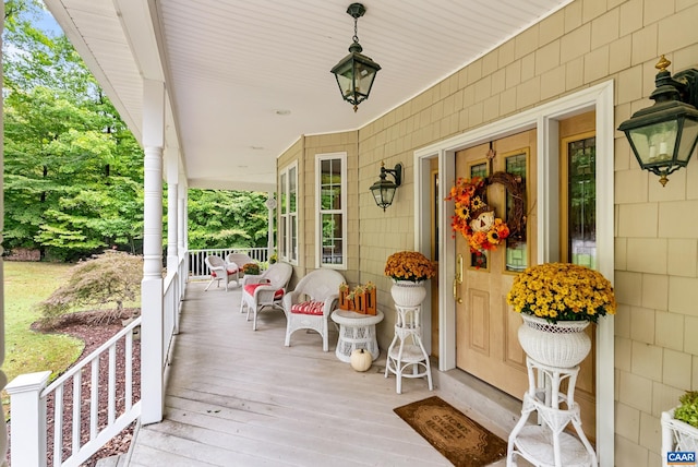 wooden deck featuring a porch