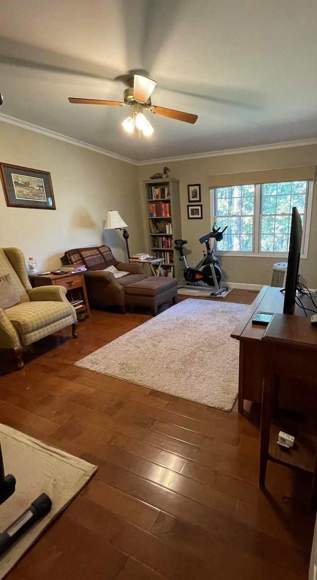 living room featuring crown molding, ceiling fan, and hardwood / wood-style floors