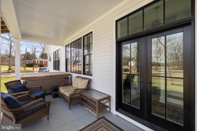 view of patio with a jacuzzi