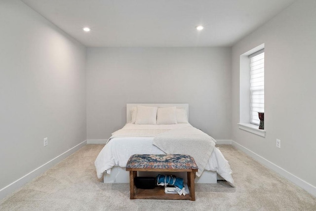 bedroom featuring recessed lighting, carpet flooring, and baseboards