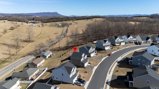 bird's eye view featuring a residential view and a mountain view