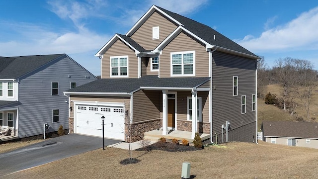 view of front of home with a garage, stone siding, aphalt driveway, and a shingled roof