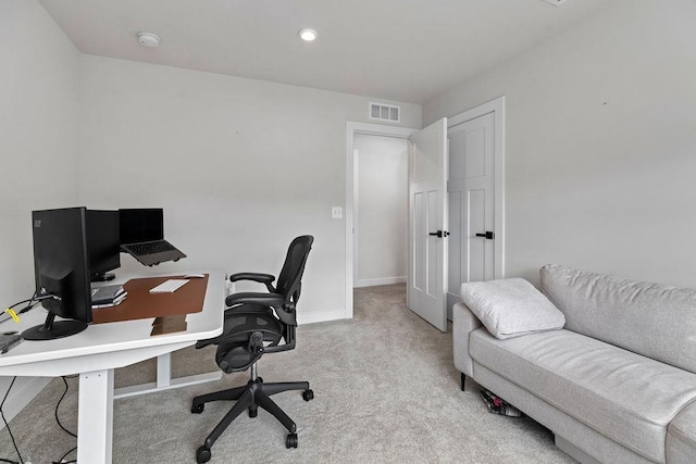 office space featuring visible vents, baseboards, carpet flooring, and recessed lighting