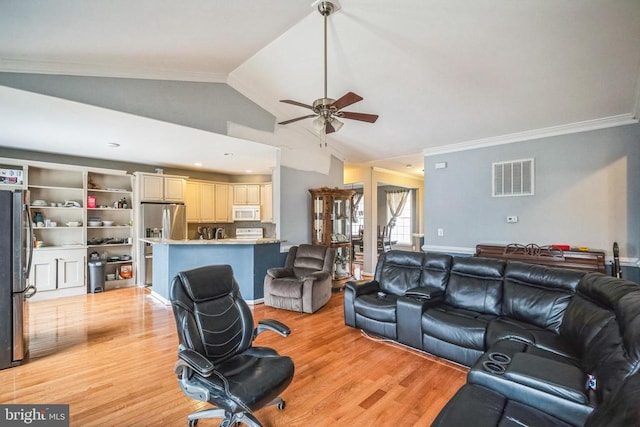 living room featuring a ceiling fan, visible vents, vaulted ceiling, light wood-style floors, and crown molding