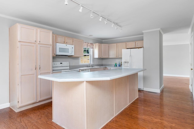 kitchen featuring white appliances, crown molding, a center island, light hardwood / wood-style floors, and light brown cabinetry