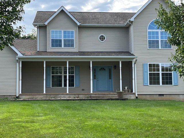 view of front of property with a front lawn and covered porch